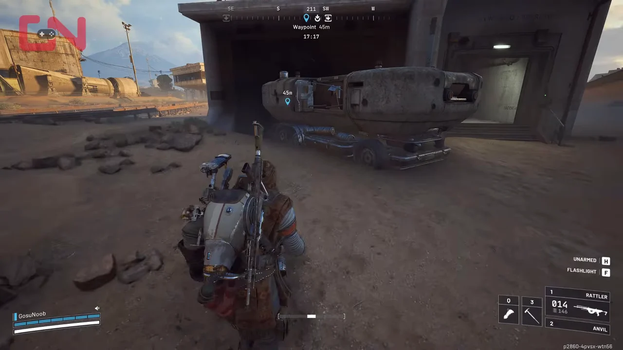 ARC Raiders Spaceport ground-level tunnel opening with a vehicle and launch-tower structure beside it.