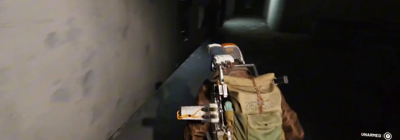 ARC Raiders Stella Montis Security Checkpoint approach along the interior corridor beside the stairs.
